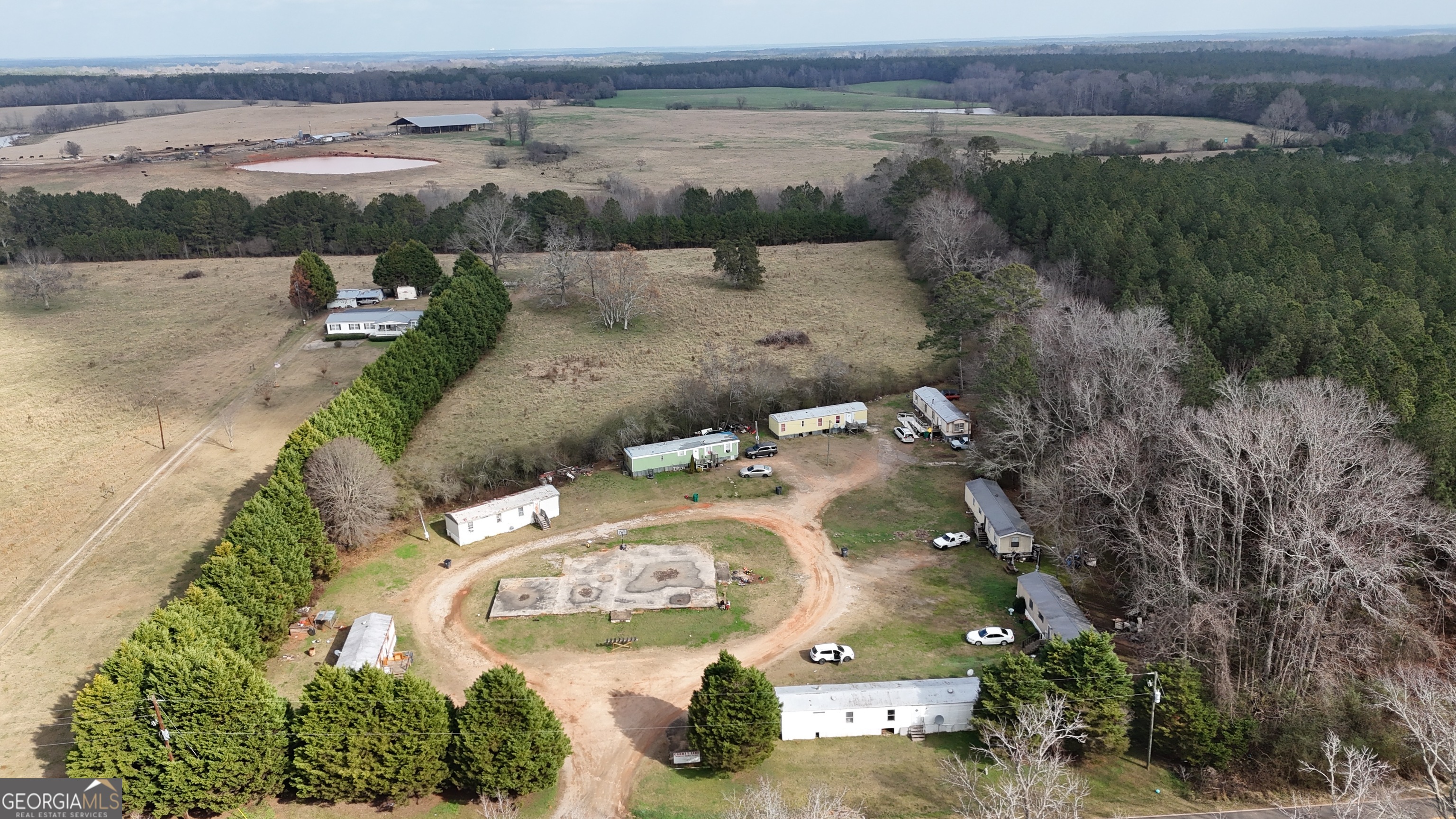 4334 Log Cabin Road Southwest White Plains, GA 30678 - Photo 20 of 20 an aerial view of a house with outdoor space