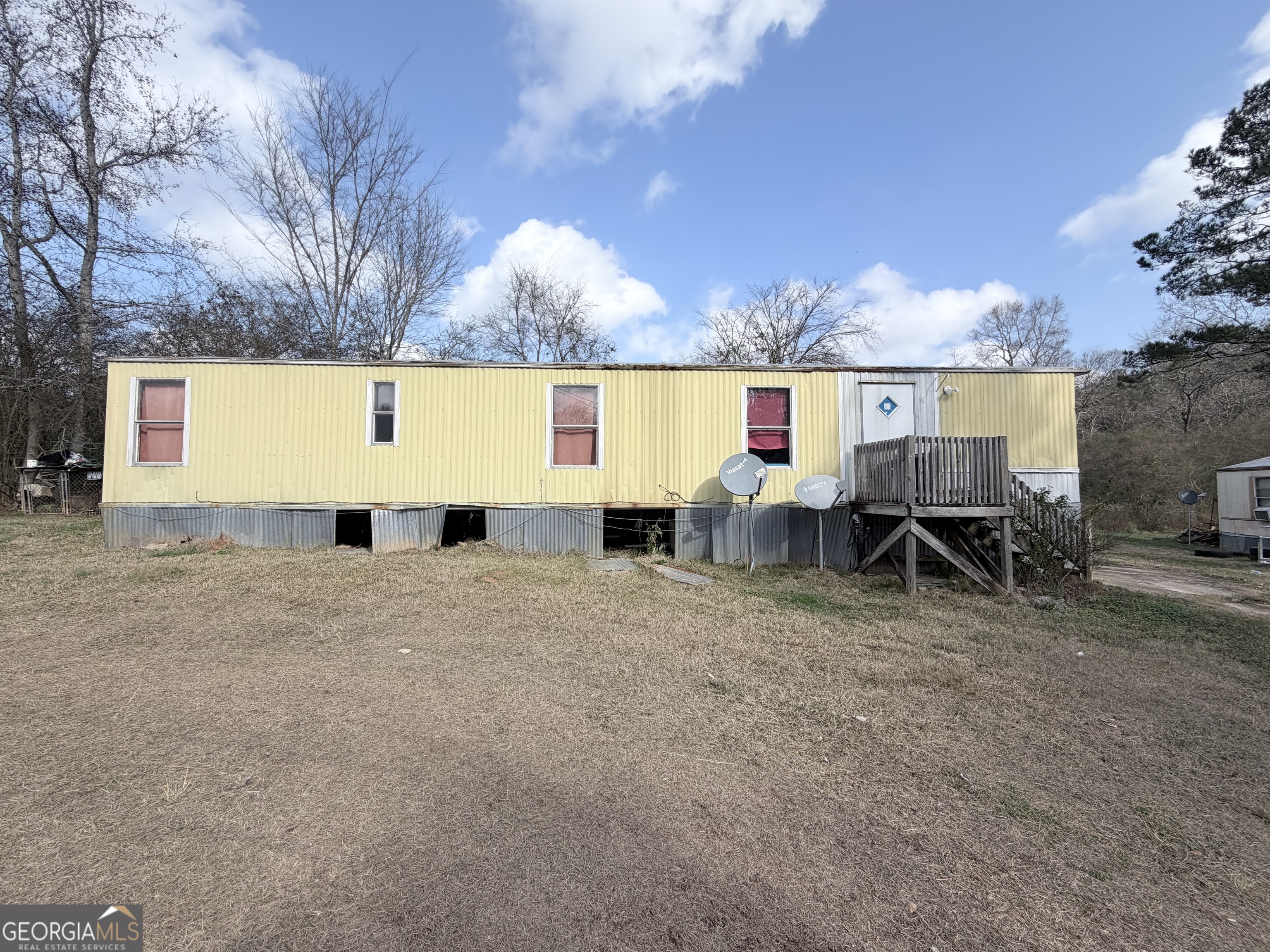 4334 Log Cabin Road Southwest White Plains, GA 30678 - Photo 8 of 20 a view of outdoor space with seating area