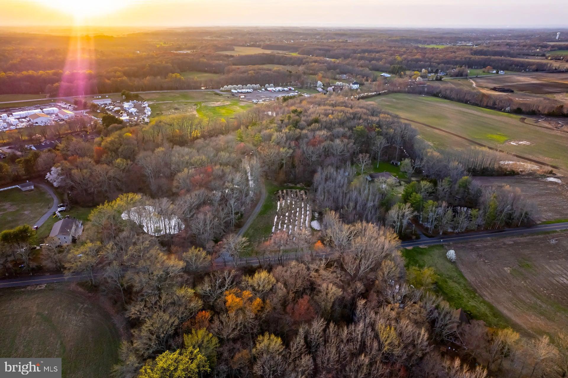 121 Moods Road Mullica Hill, NJ 08062 - Photo 14 of 22 an aerial view of city and lake