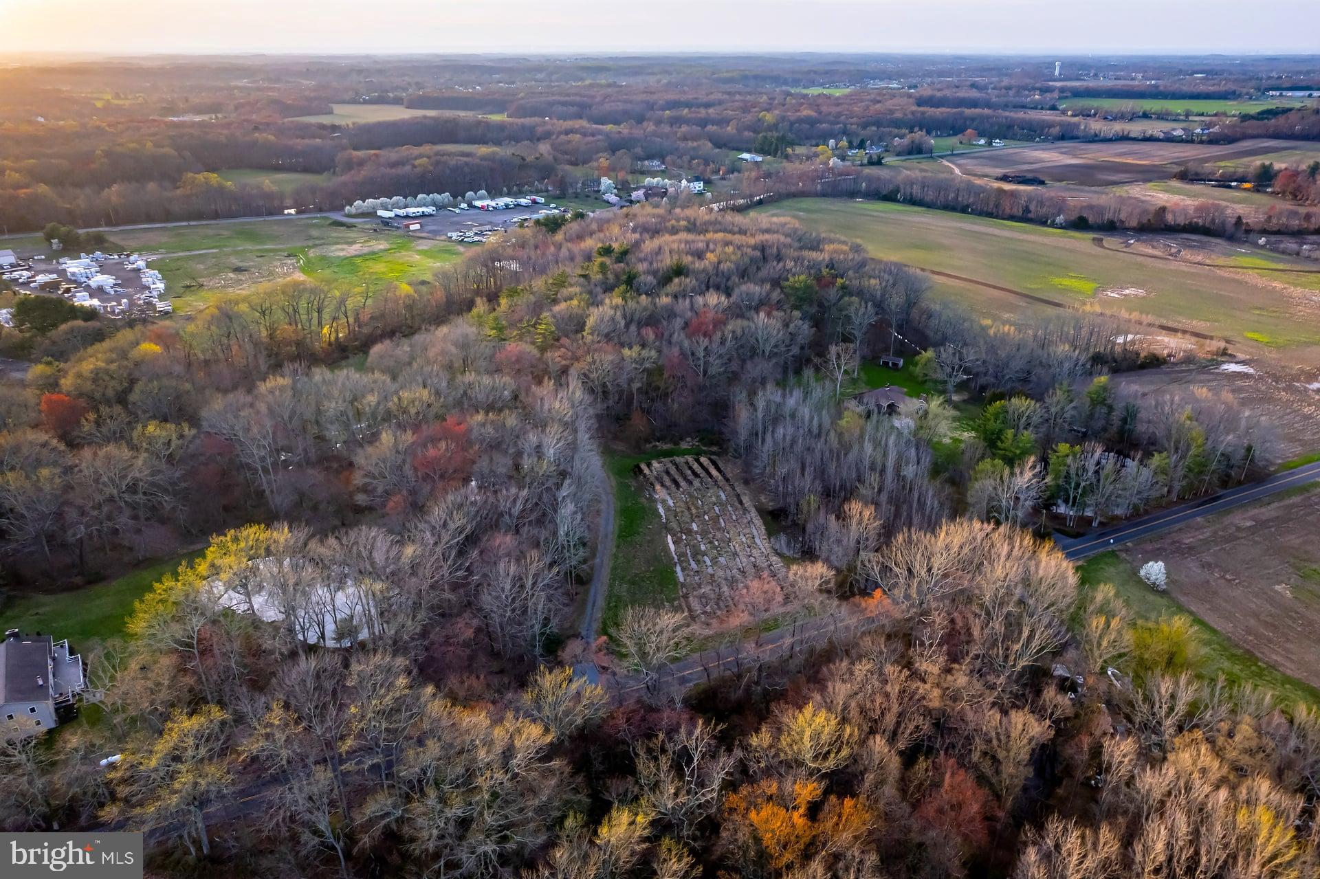 121 Moods Road Mullica Hill, NJ 08062 - Photo 15 of 22 a view of a lake with mountains in the background