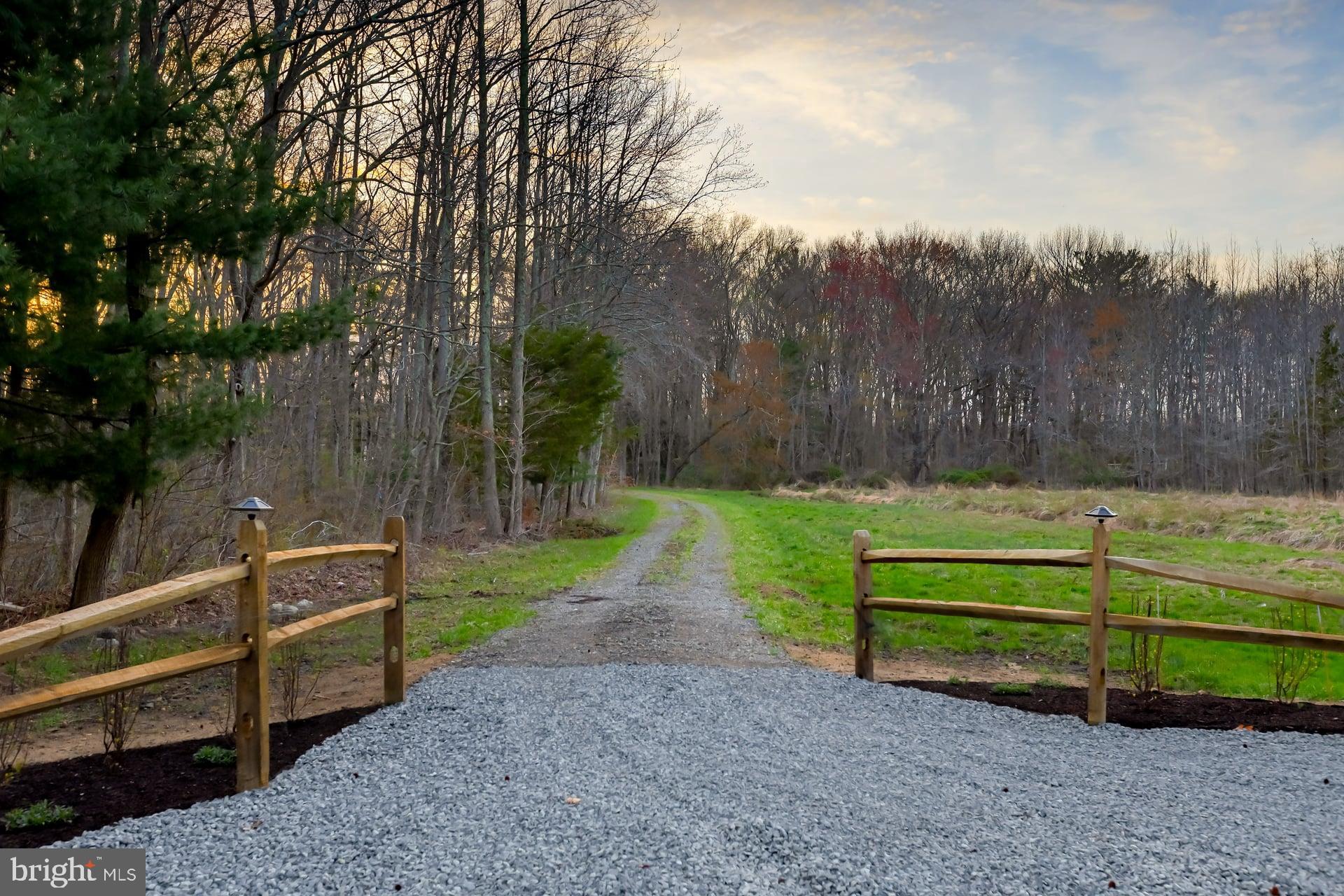 121 Moods Road Mullica Hill, NJ 08062 - Photo 2 of 22 a view of a park with large trees