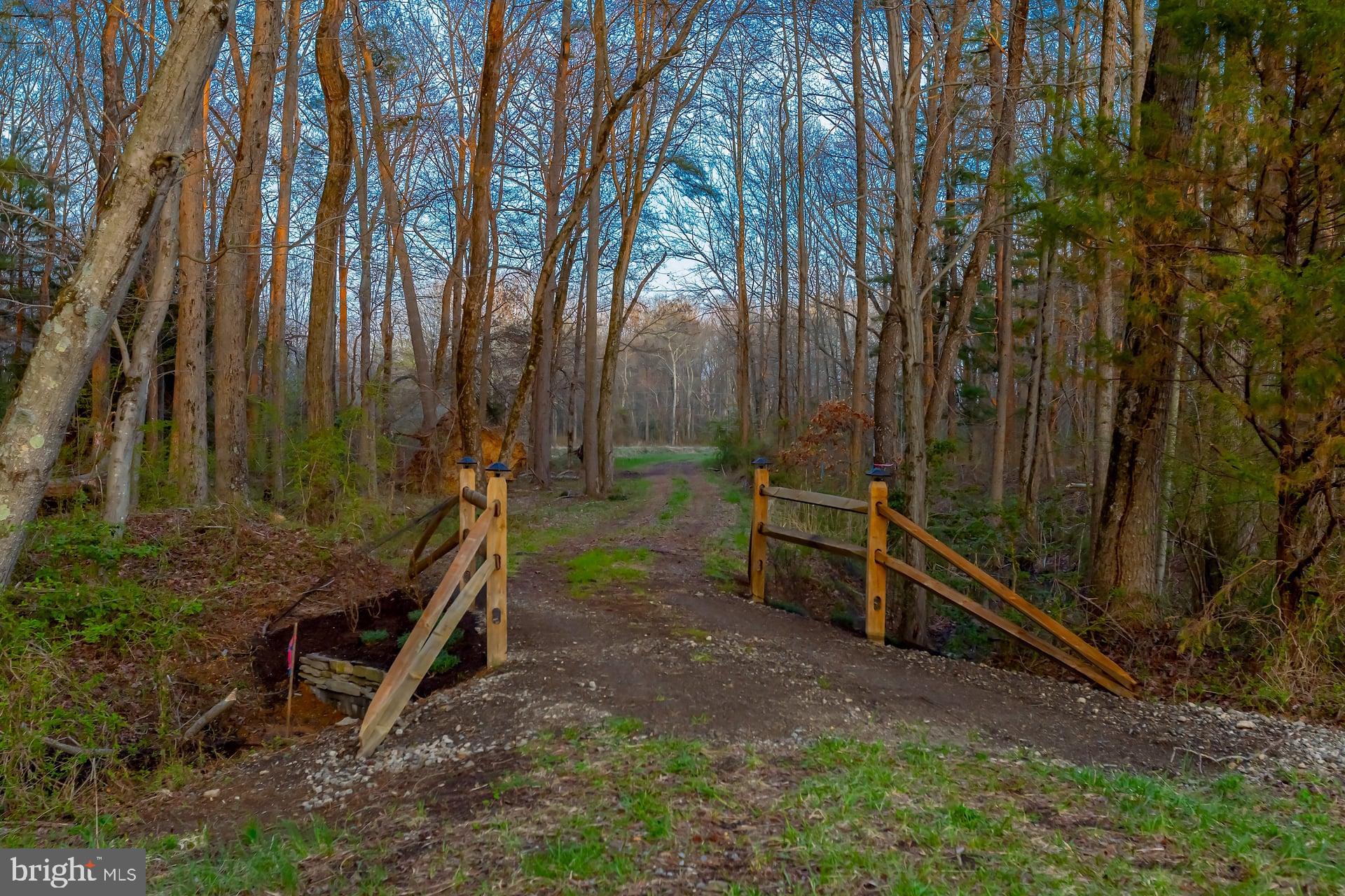 121 Moods Road Mullica Hill, NJ 08062 - Photo 3 of 22 a backyard of a house with lots of green space