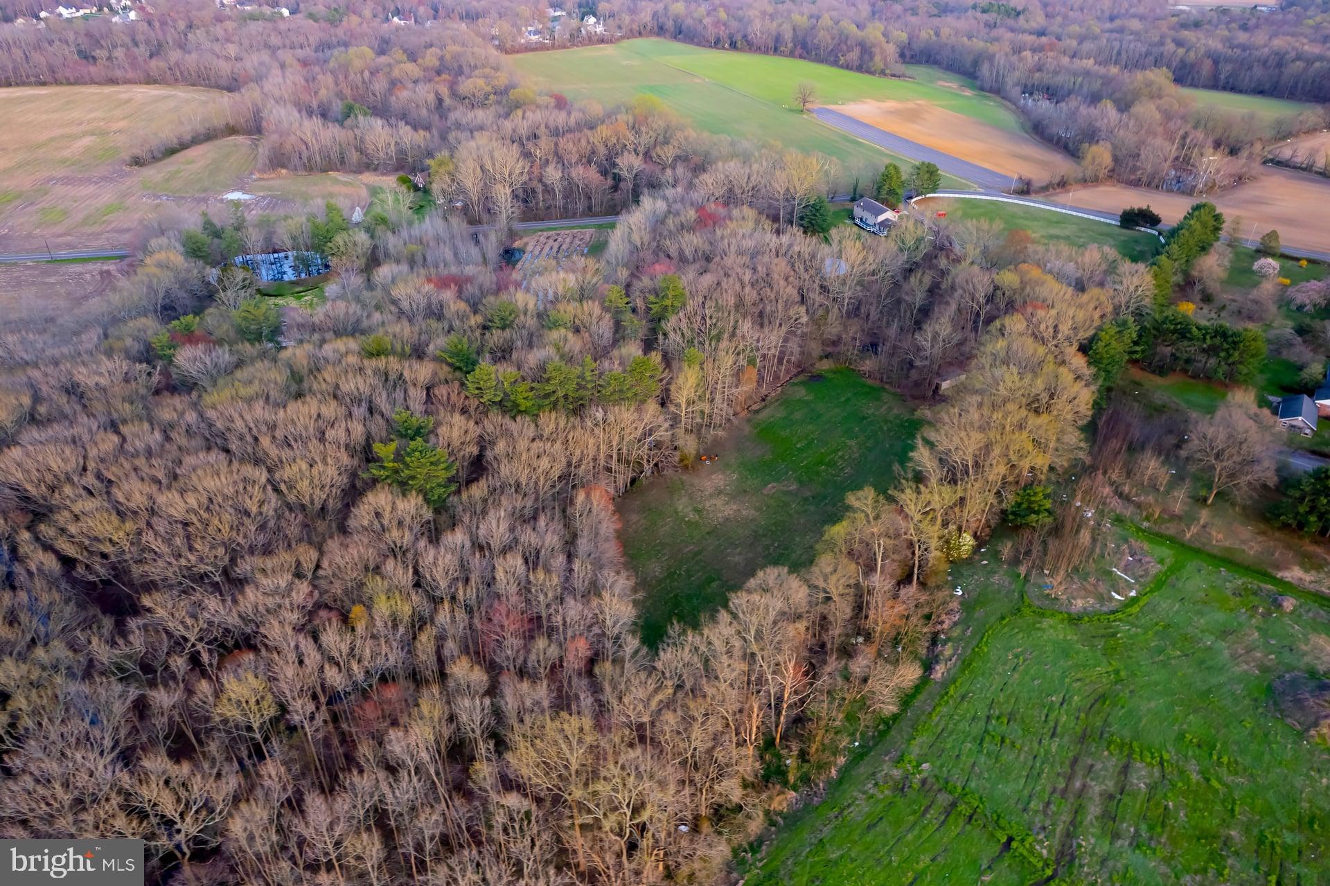 121 Moods Road Mullica Hill, NJ 08062 - Photo 9 of 22 a view of a houses with a yard