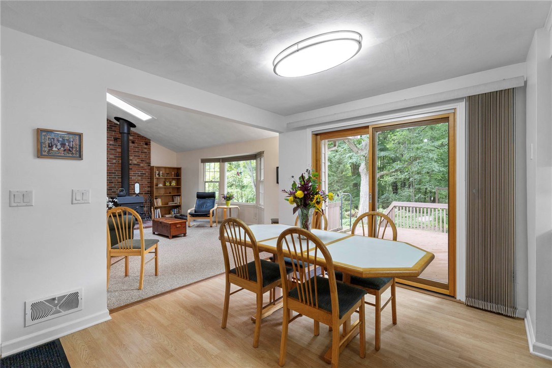 693 Ashdon Circle Webster, NY 14580 - Photo 14 of 50 Pella sliders off eat-in kitchen to deck