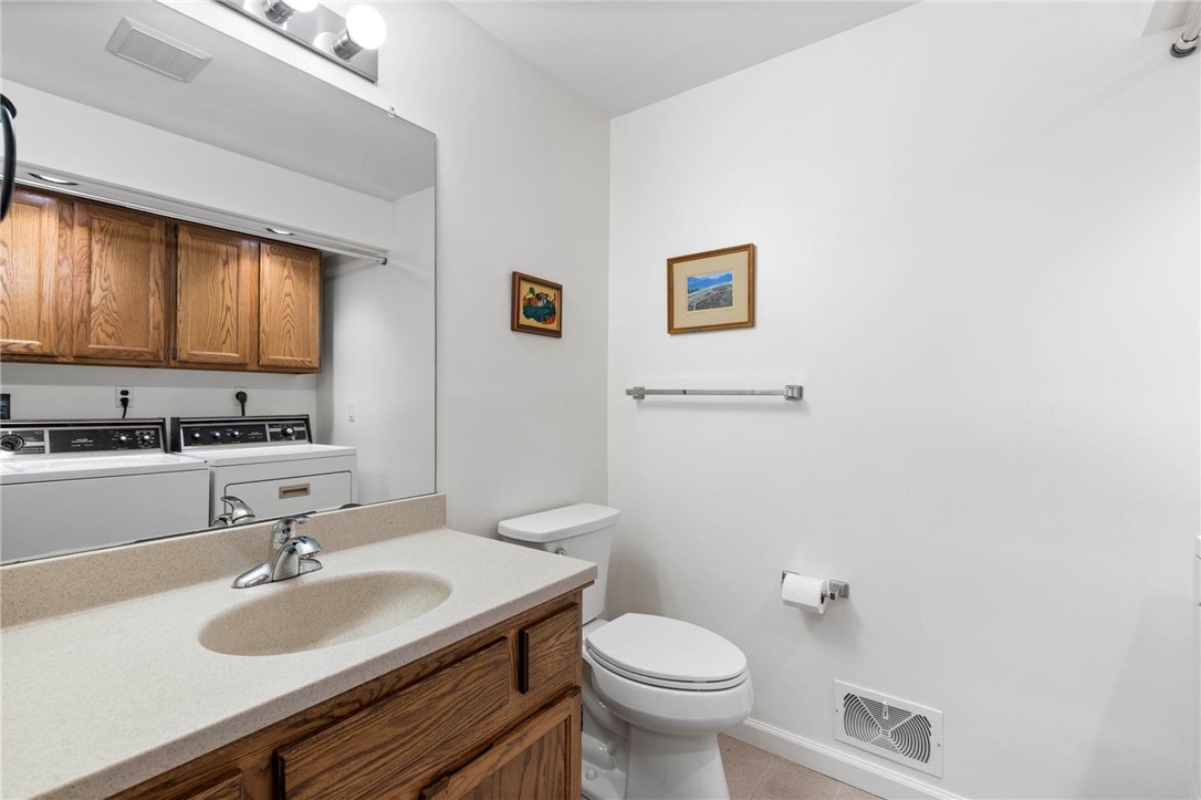 693 Ashdon Circle Webster, NY 14580 - Photo 23 of 50 1st fl powder room combo laundy room