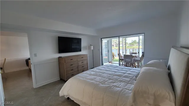 a bedroom with a bed and furniture