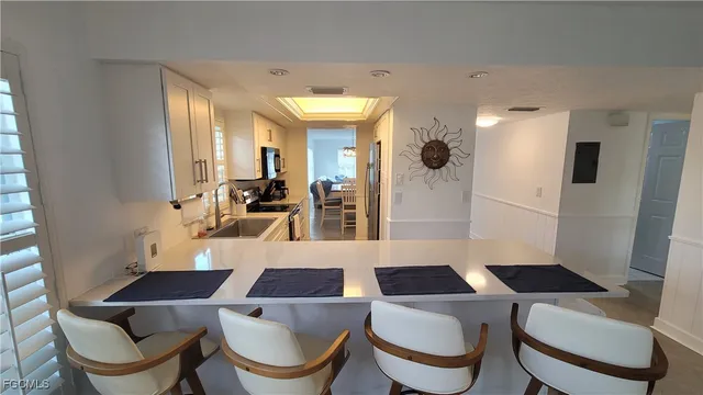 a living room with a couch and a table