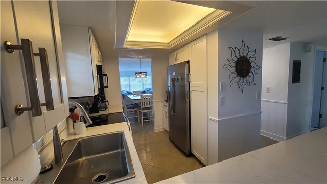 a view of a living room with furniture