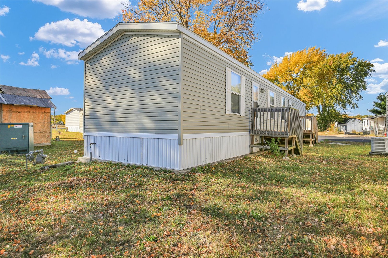 1216 Sycamore Lane Rantoul, IL 61866 - Photo 23 of 26 a view of a backyard with wooden fence