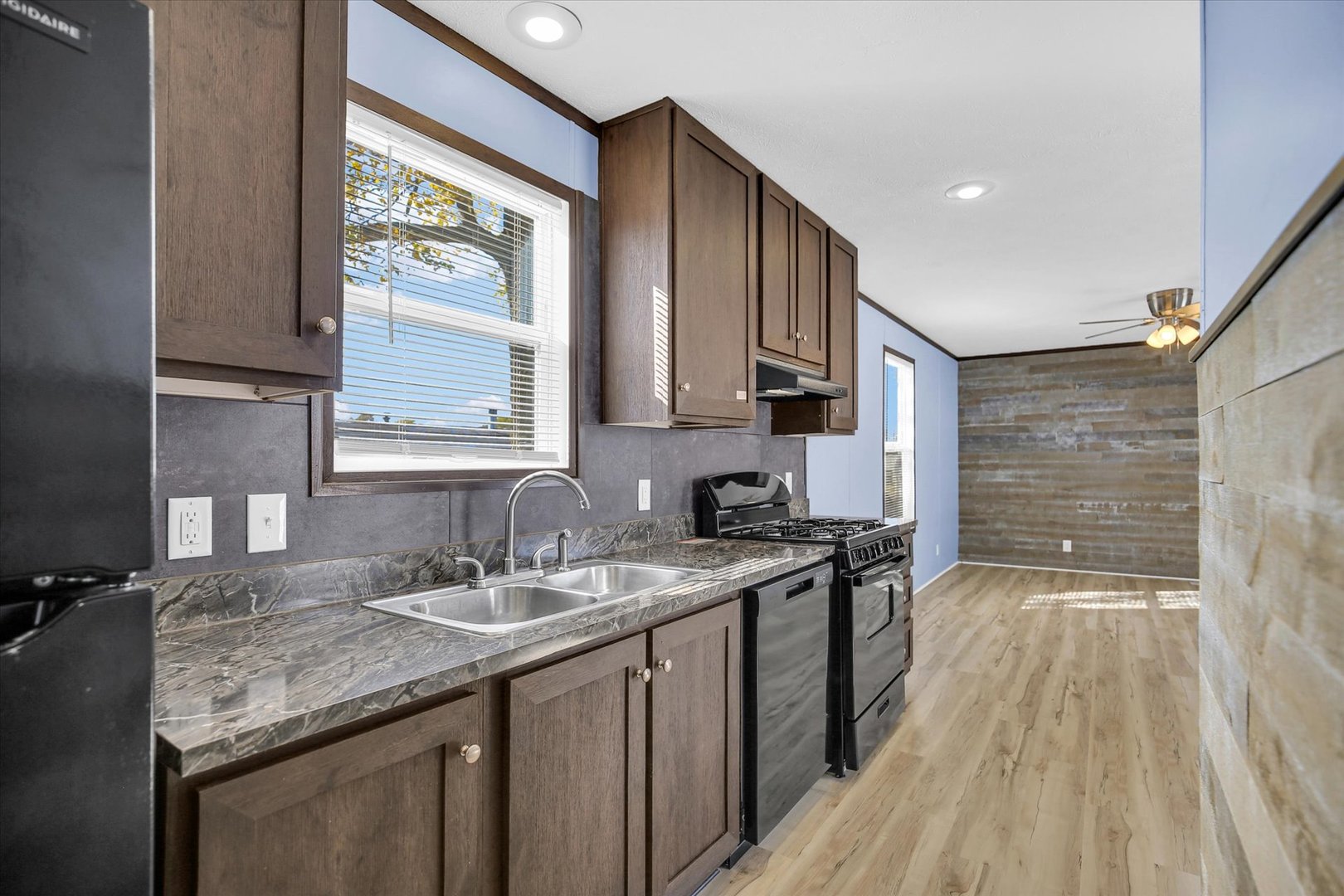 1216 Sycamore Lane Rantoul, IL 61866 - Photo 8 of 26 a kitchen with a sink stove and cabinets