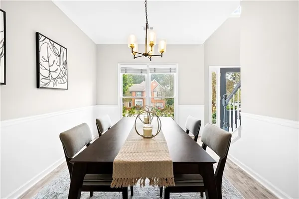 a view of a dining room with furniture
