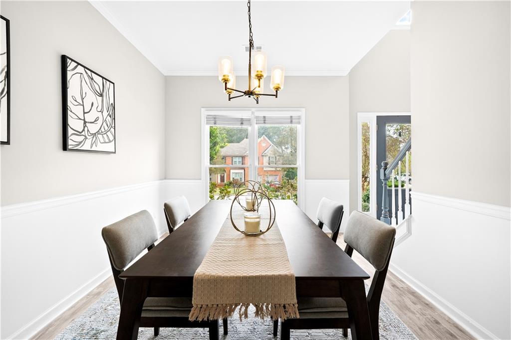 3720 Brookefall Landing Suwanee, GA 30024 - Photo 11 of 41 a view of a dining room with furniture window and outside view