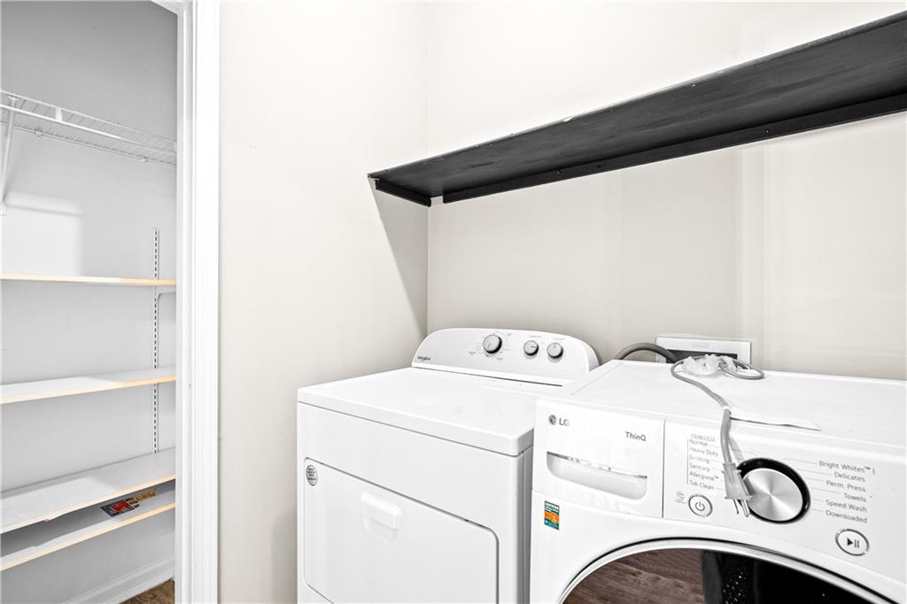 3720 Brookefall Landing Suwanee, GA 30024 - Photo 21 of 41 a utility room with dryer and washer