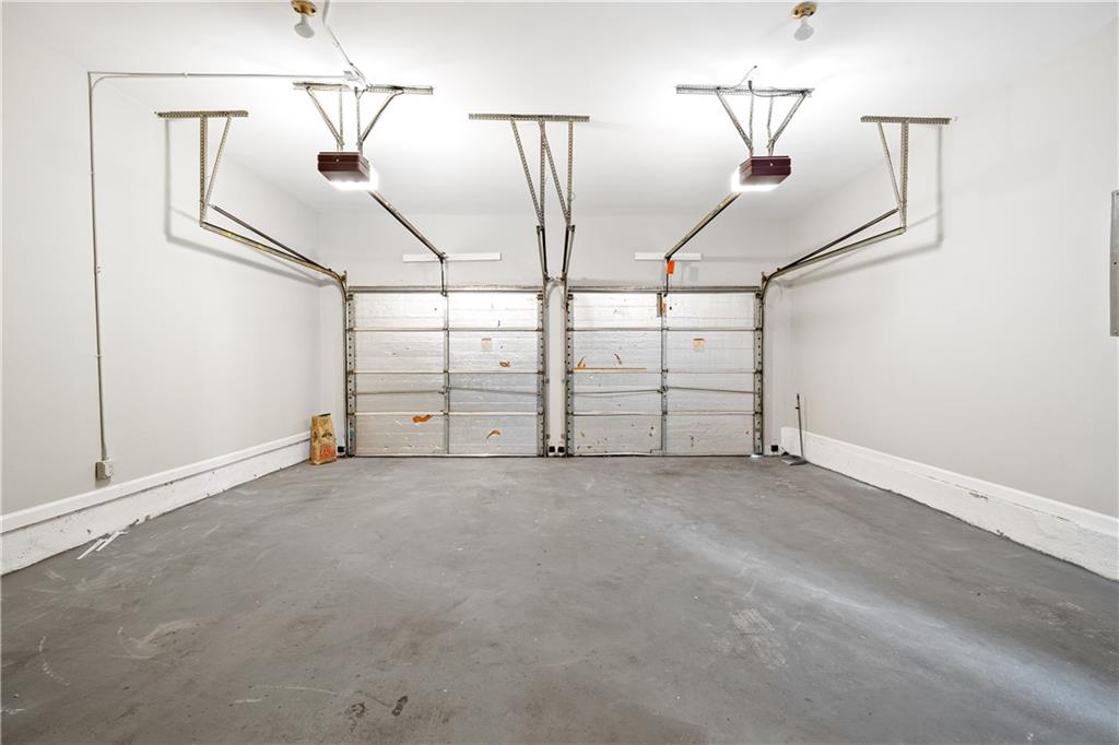 3720 Brookefall Landing Suwanee, GA 30024 - Photo 37 of 41 a view of a garage with stairs