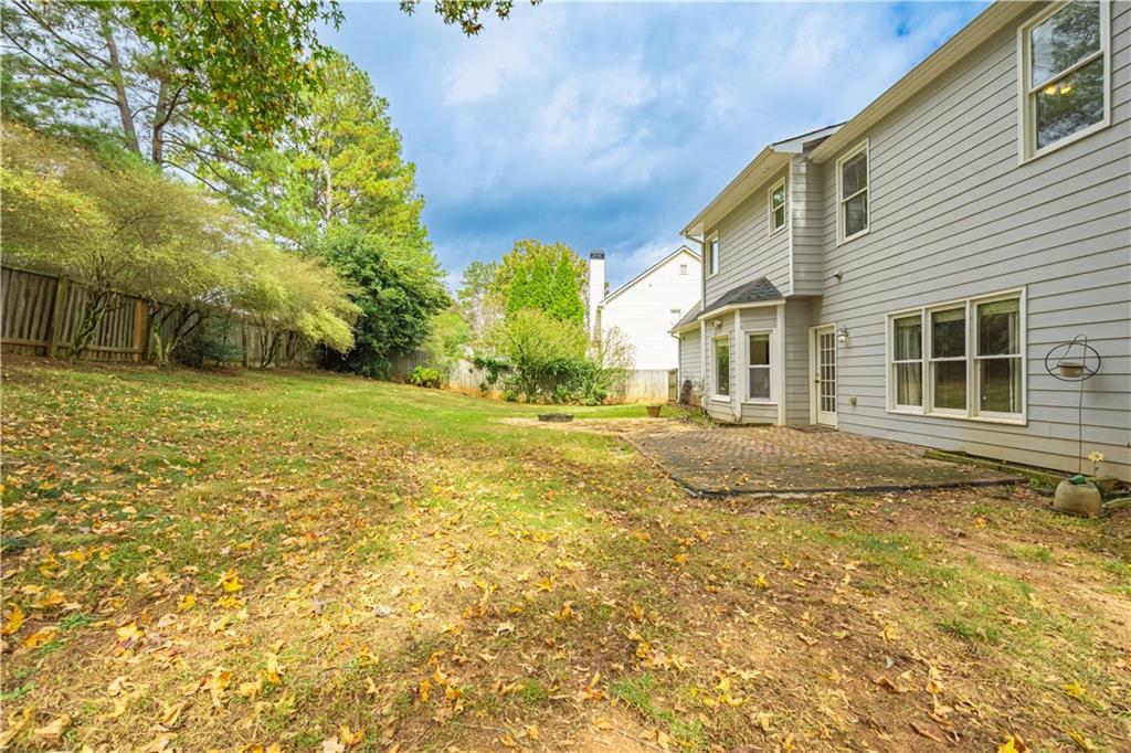 3720 Brookefall Landing Suwanee, GA 30024 - Photo 40 of 41 a view of a house with a yard