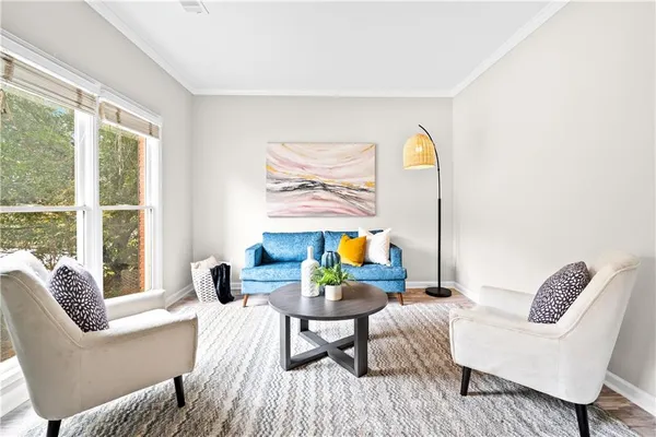 a living room with furniture and a window