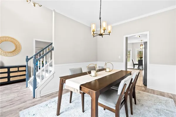 a view of a dining room with furniture window and outside view