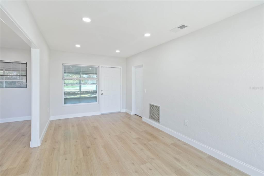 5337 60th Street North Kenneth City, FL 33709 - Photo 14 of 29 an empty room with windows