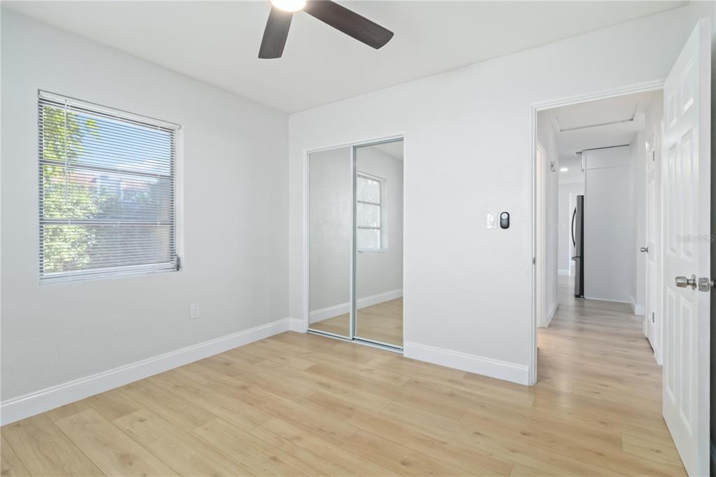 5337 60th Street North Kenneth City, FL 33709 - Photo 17 of 29 an empty room with windows and closet