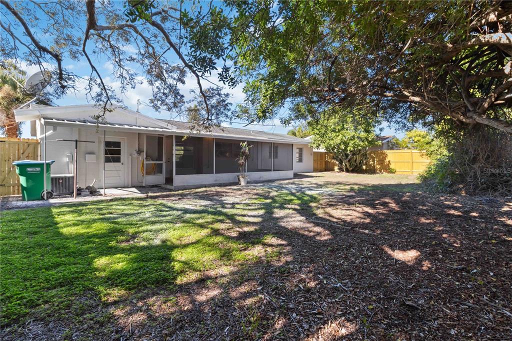 5337 60th Street North Kenneth City, FL 33709 - Photo 27 of 29 a view of a house with a yard
