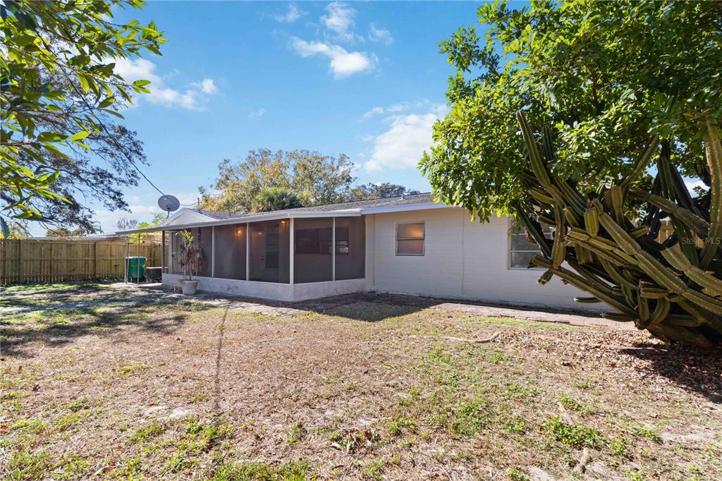 5337 60th Street North Kenneth City, FL 33709 - Photo 28 of 29 a view of a house with a yard