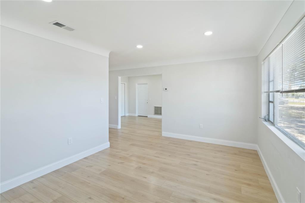 5337 60th Street North Kenneth City, FL 33709 - Photo 3 of 29 a view of an empty room and window