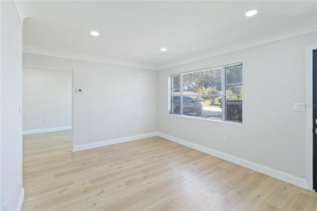5337 60th Street North Kenneth City, FL 33709 - Photo 4 of 29 a view of an empty room with a window