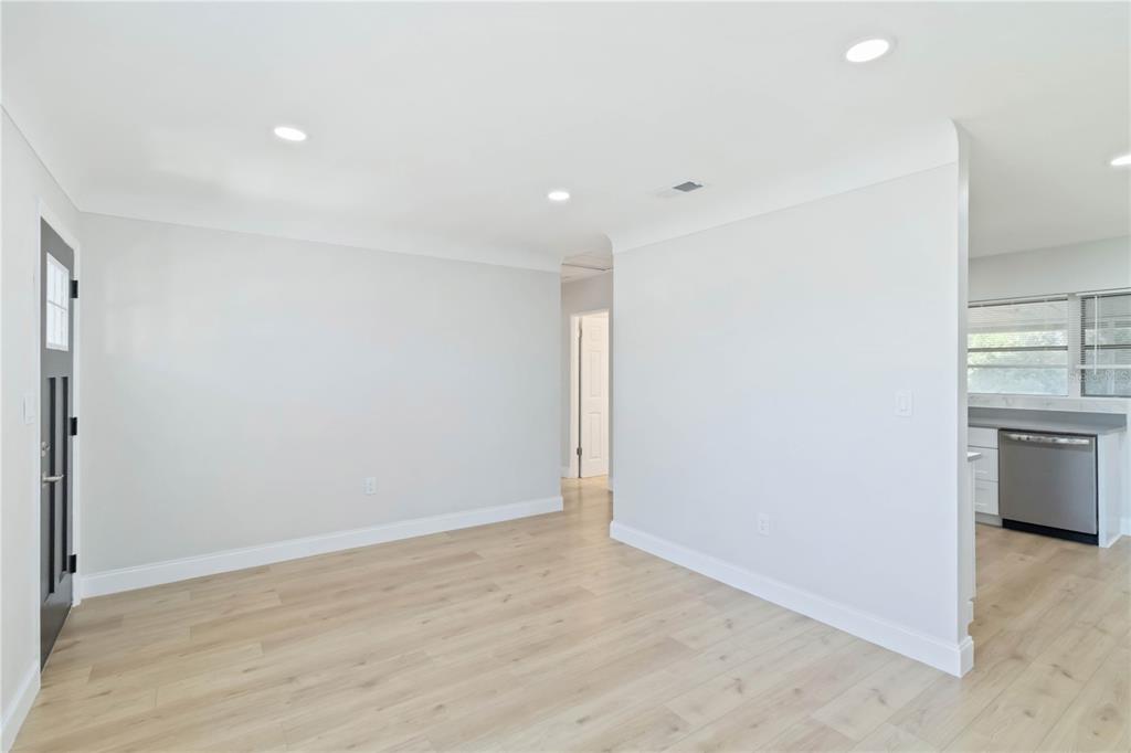 5337 60th Street North Kenneth City, FL 33709 - Photo 5 of 29 a view of a kitchen cabinets and a window