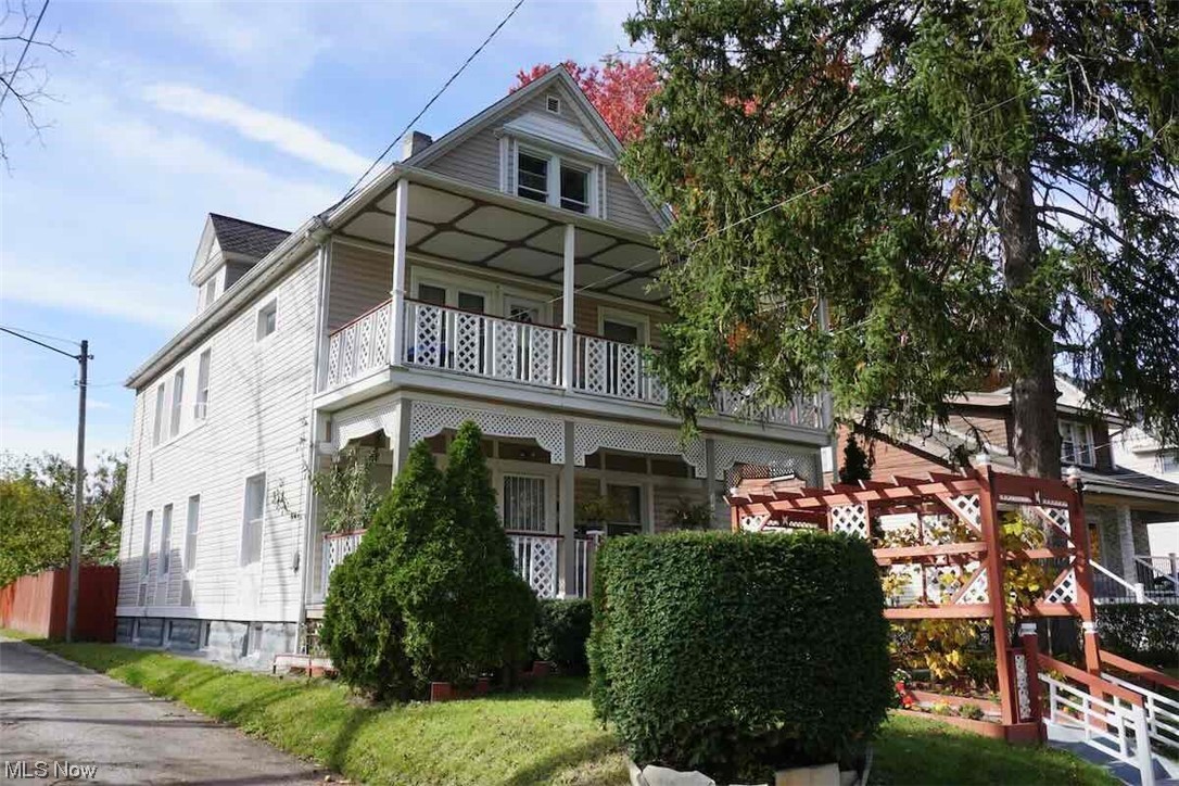 3756 Bosworth Road Cleveland, OH 44111 - Photo 1 of 23 View of front facade featuring a pergola and a balcony