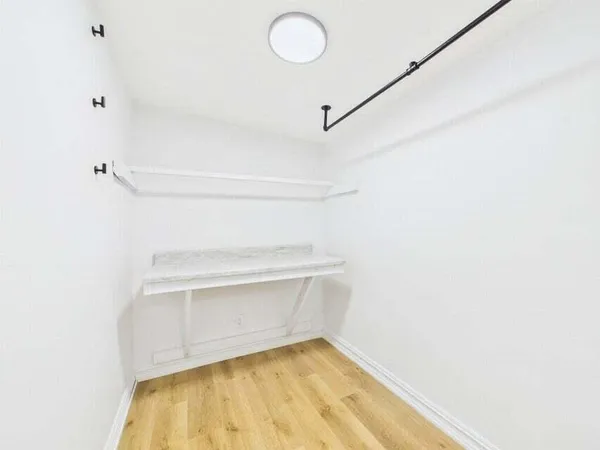 a view of a room with racks on the wall