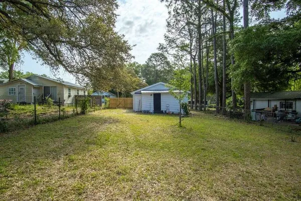 a house with trees in front of it