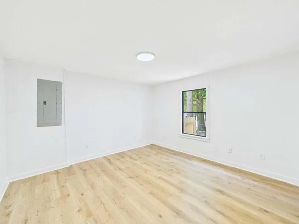 an empty room with a window