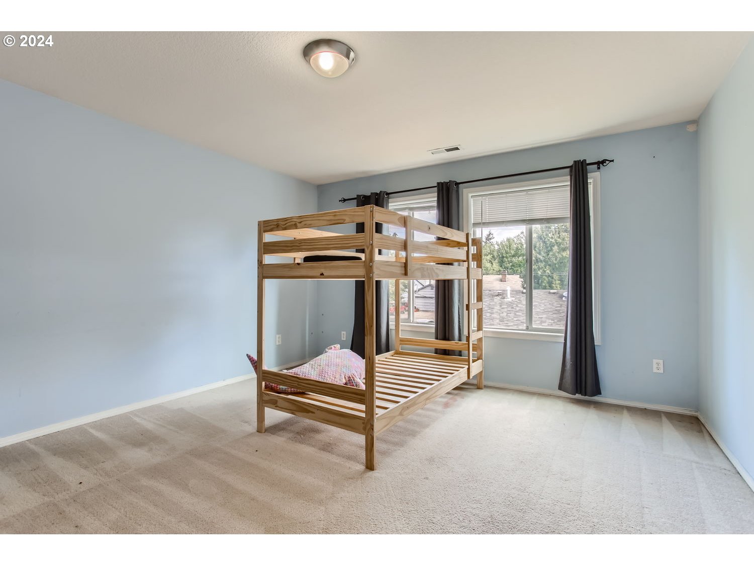 11405 Southeast Clinton Street Portland, OR 97266 - Photo 22 of 29 a room with gym equipment and large window