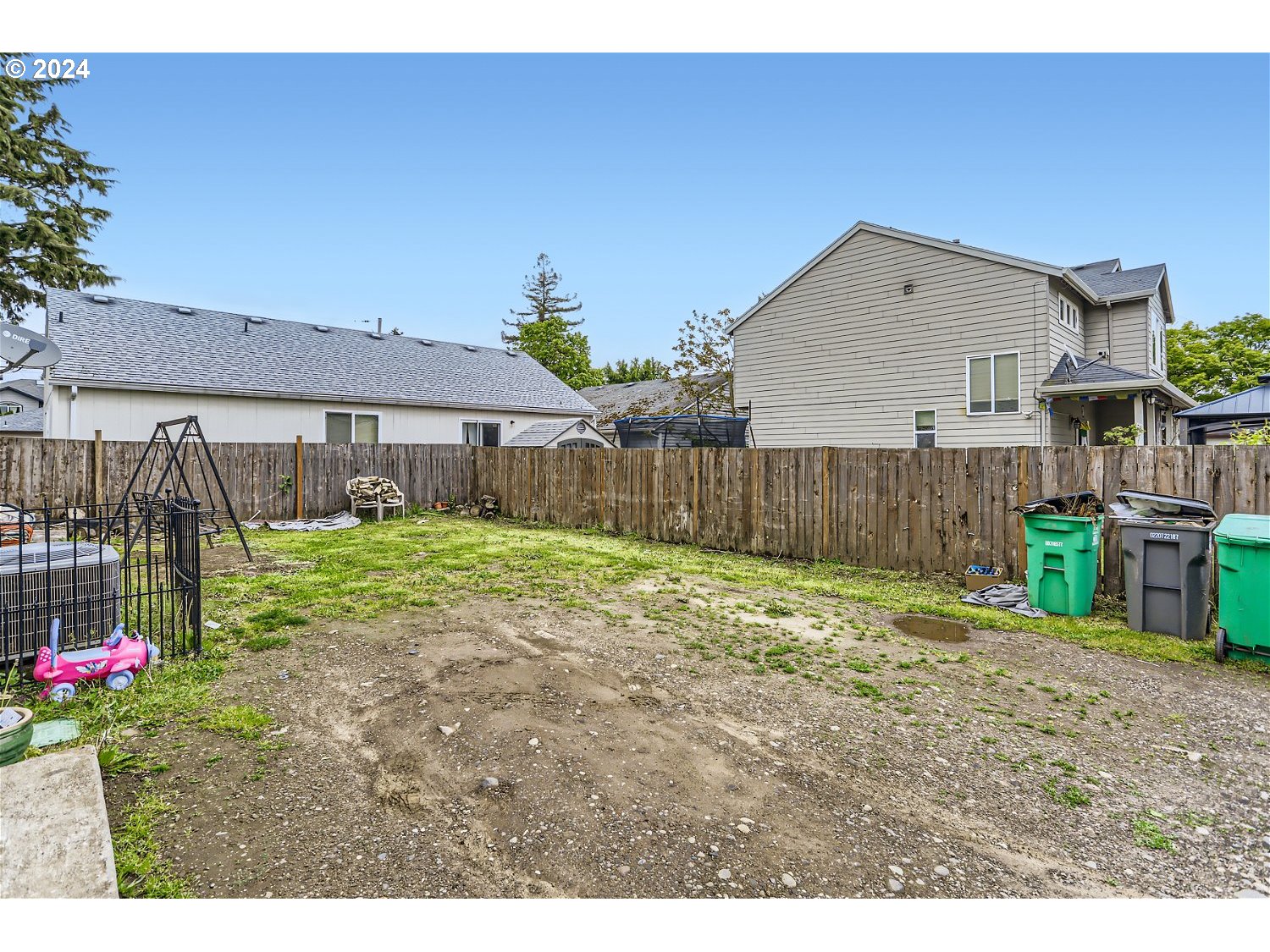 11405 Southeast Clinton Street Portland, OR 97266 - Photo 29 of 29 a backyard of a house with table and chairs