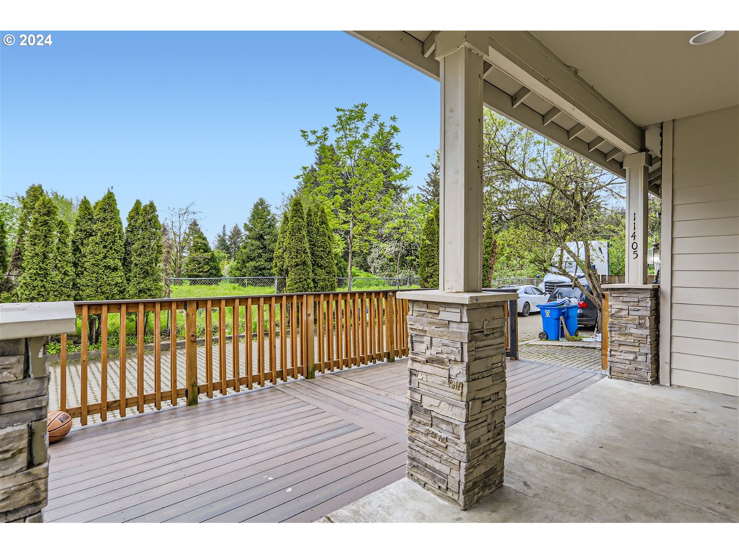 11405 Southeast Clinton Street Portland, OR 97266 - Photo 3 of 29 a deck view with a garden