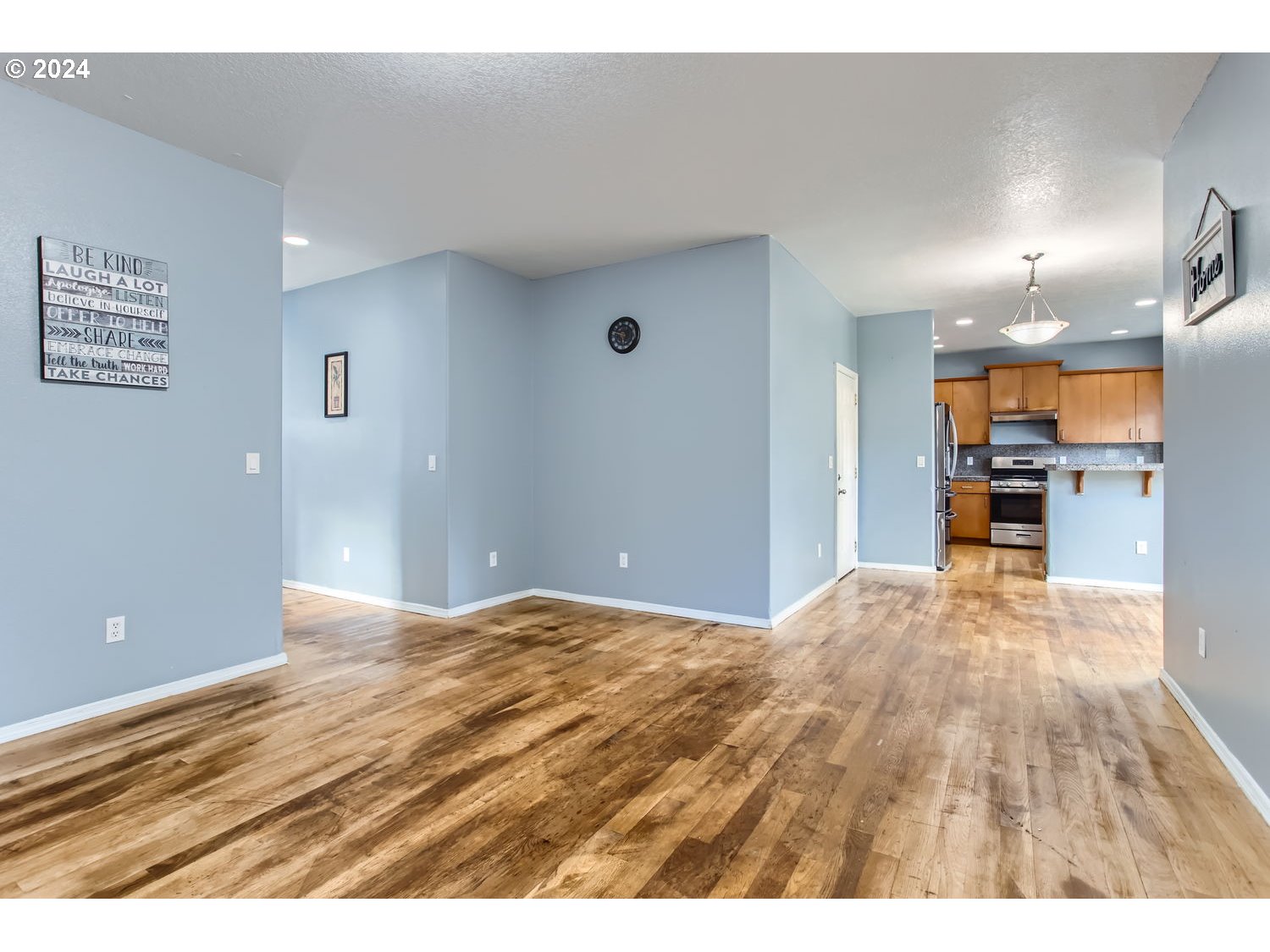 11405 Southeast Clinton Street Portland, OR 97266 - Photo 8 of 29 a view of livingroom with hardwood floor