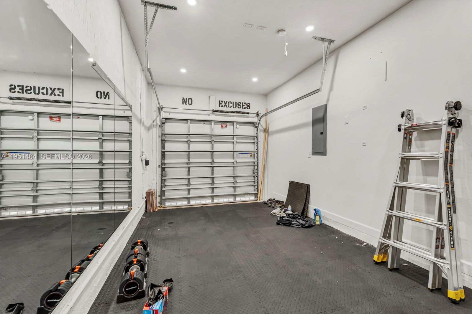 13067 Southwest 286th Street, Unit 13067 Homestead, FL 33033 - Photo 11 of 37 a view of a room with gym equipment