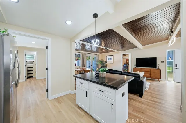 a kitchen with counter top space and stainless steel appliances