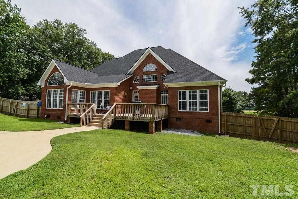 1308 Pagan Road Raleigh, NC 27603 - Photo 6 of 30 front view of a house with a yard