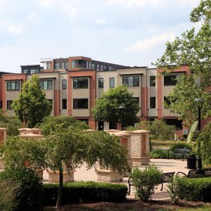 front view of a house with a garden