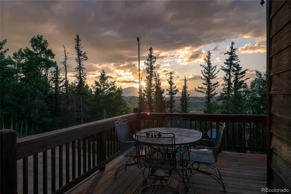 a view of a two chairs in the deck