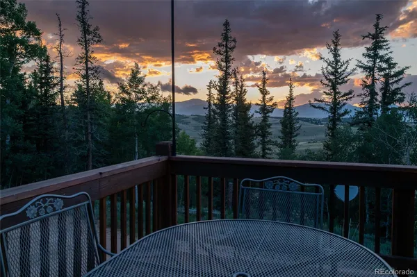 a view of forest from a balcony
