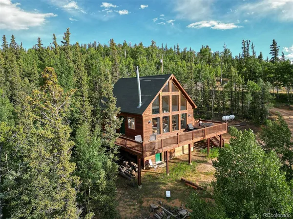 a view of an ocean and mountain