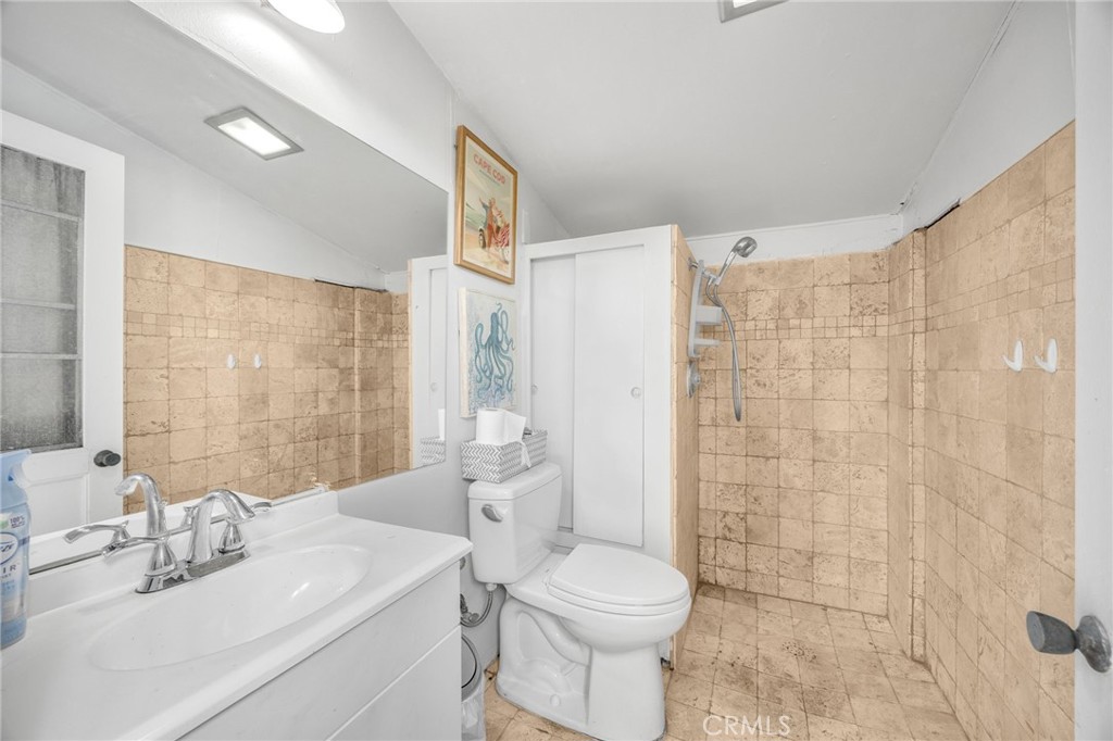 325 Delphia Avenue Brea, CA 92821 - Photo 35 of 37 Pool Bathroom/shower in backyard
