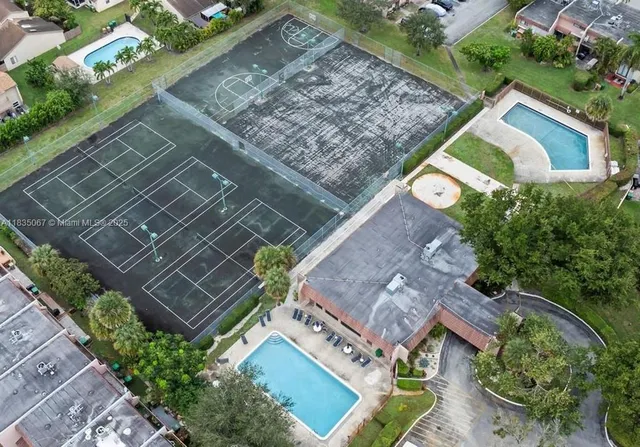 a view of a park with swings