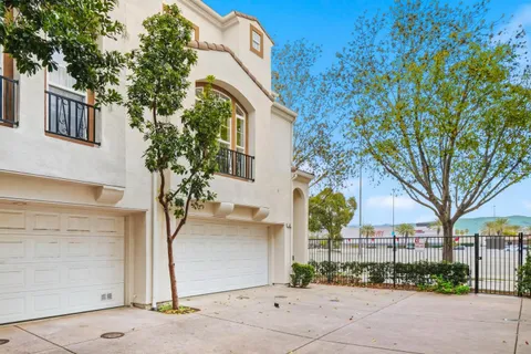 a view of a house with a street