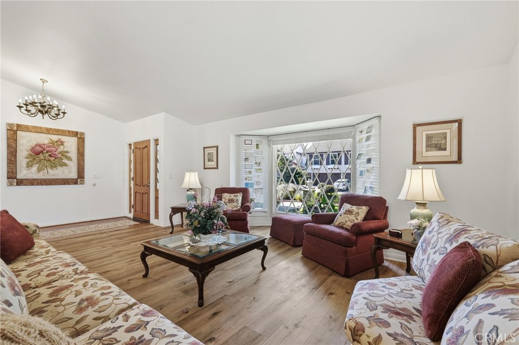 18233 Charlton Lane Porter Ranch, CA 91326 - Photo 29 of 40 a living room with furniture and a large window