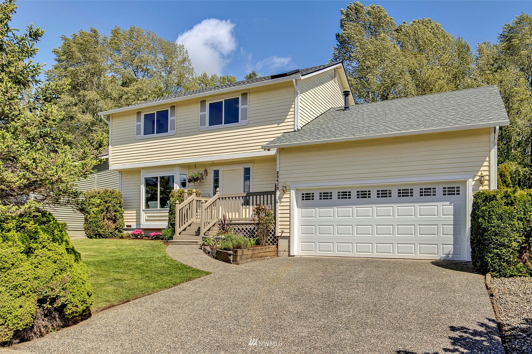 23413 12th Place West Bothell, WA 98021 - Photo 1 of 39 front view of a house with a yard