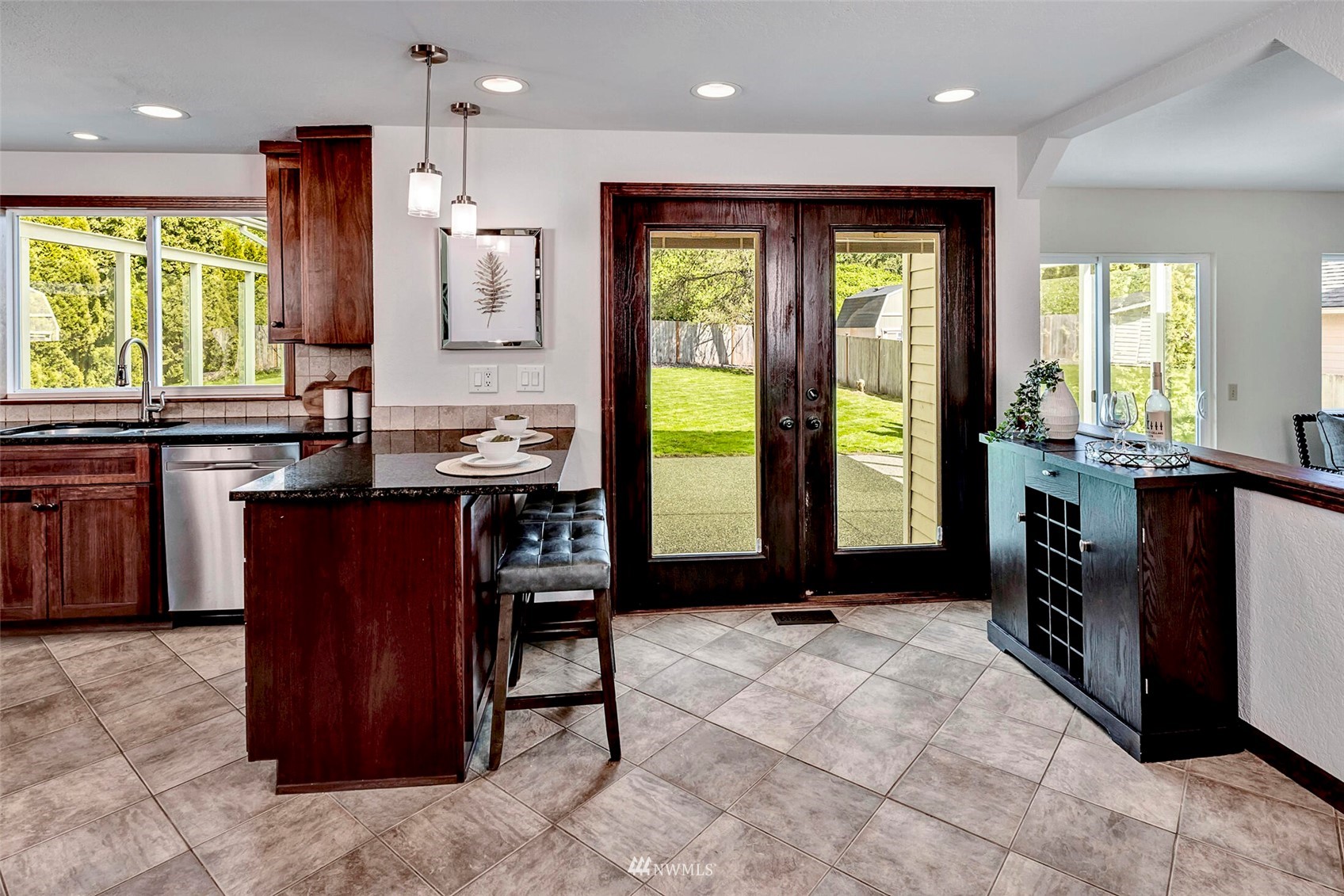 23413 12th Place West Bothell, WA 98021 - Photo 12 of 39 a kitchen with a sink refrigerator and window