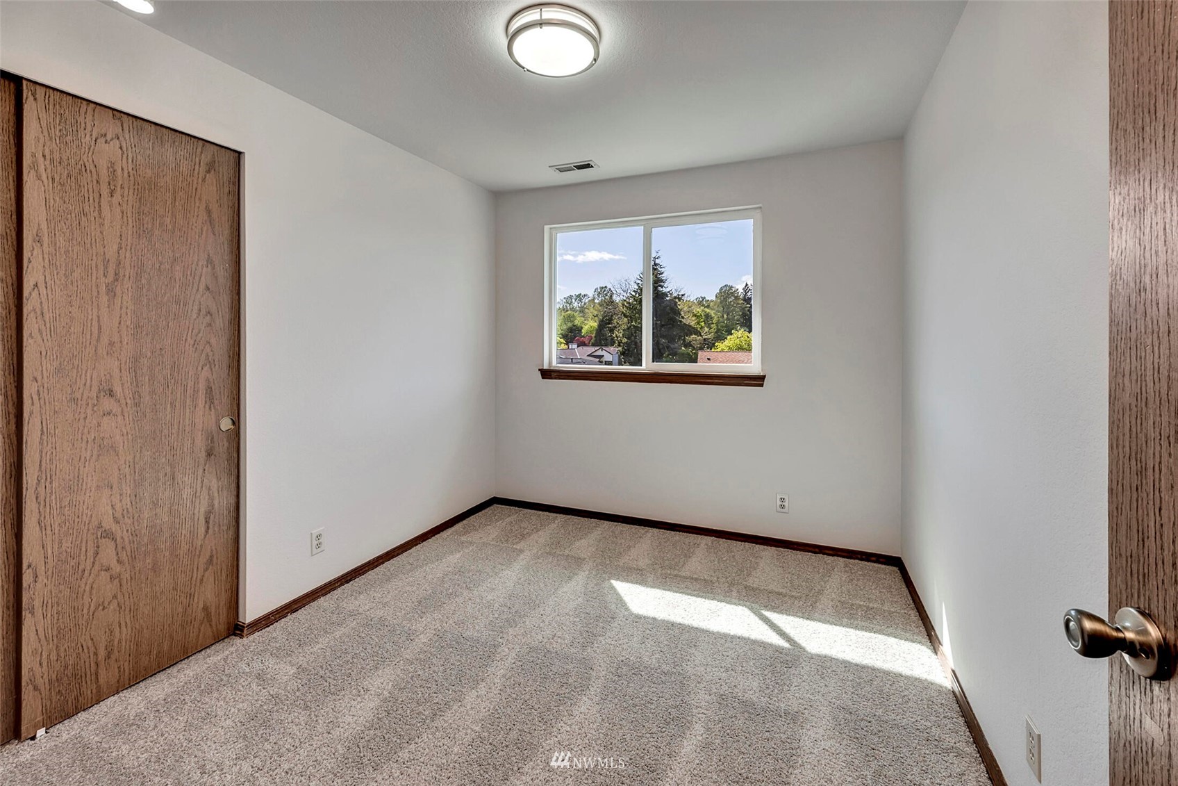 23413 12th Place West Bothell, WA 98021 - Photo 22 of 39 an empty room with windows